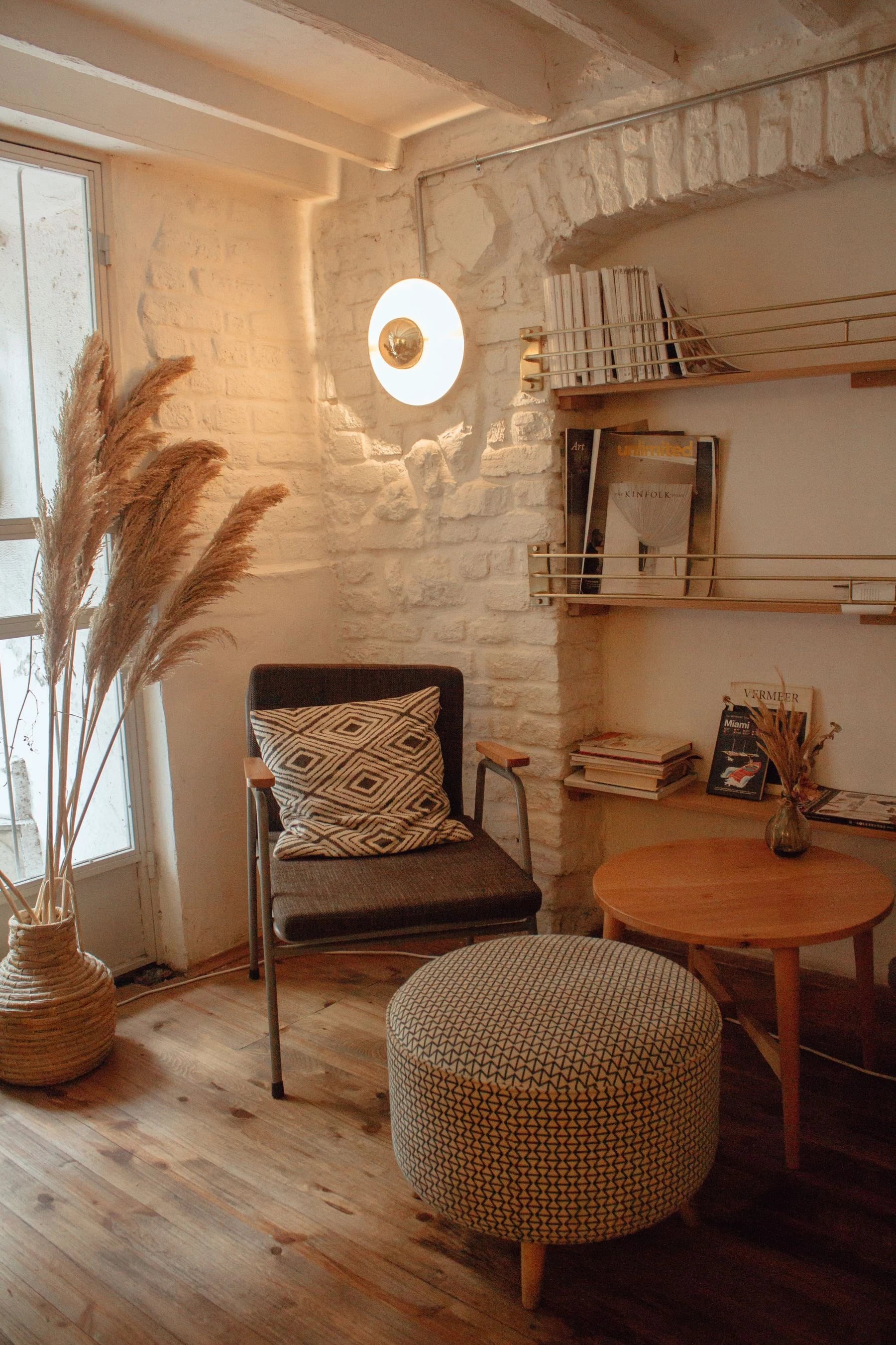 Warm and inviting modern living space with natural decor and a cozy atmosphere. Reference photograph for Nocturne House.