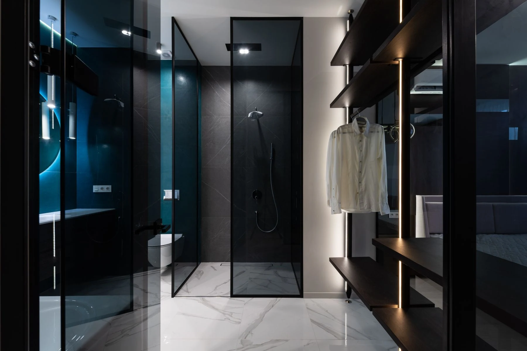 Discover sleek modern design featuring a bathroom with walk-in shower and closet. Reference photograph for Nocturne House.