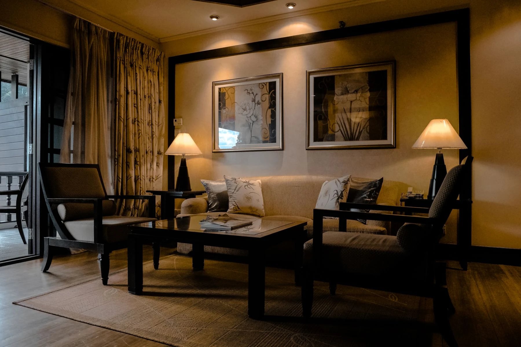 Living room featuring elegant furniture and warm lighting. Reference photograph for The Avara Villa.